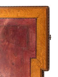 An Austrian Carved Oak Writing Table
