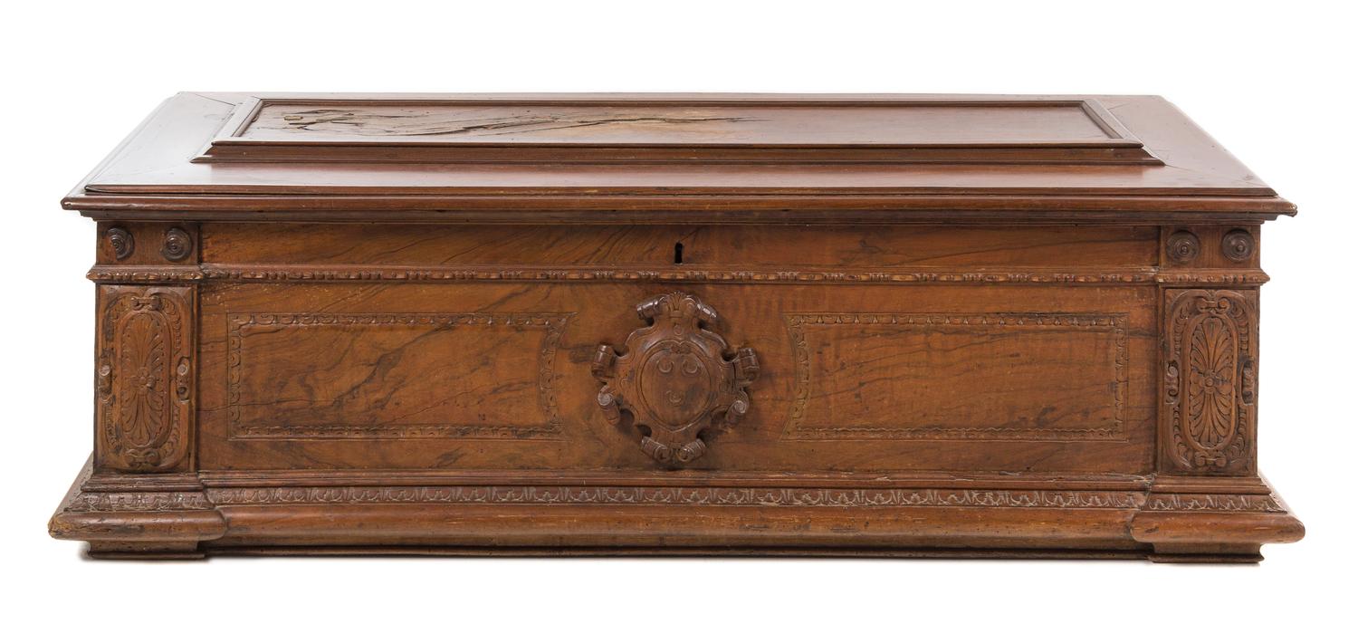 A Florentine Walnut Cassone Height 21 x width 69 x depth 25 inches. — 16TH/17TH CENTURY
