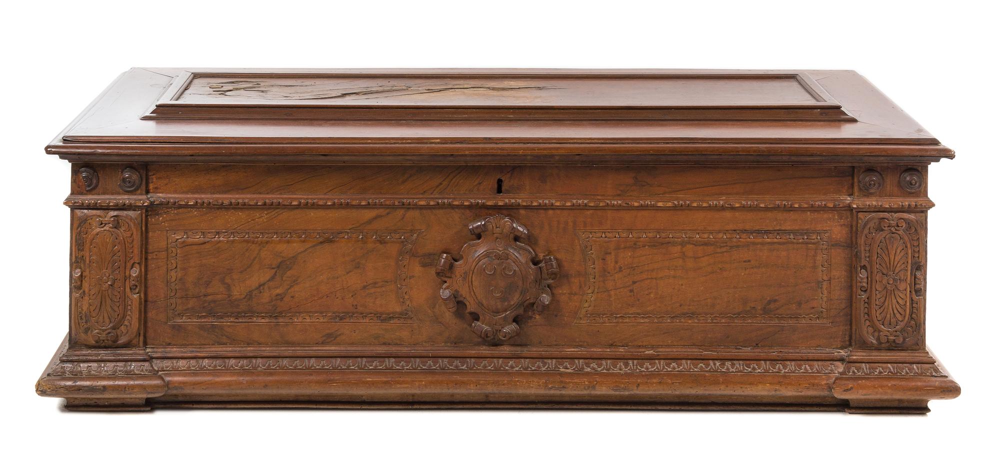 A Florentine Walnut Cassone Height 21 x width 69 x depth 25 inches. — 16TH/17TH CENTURY