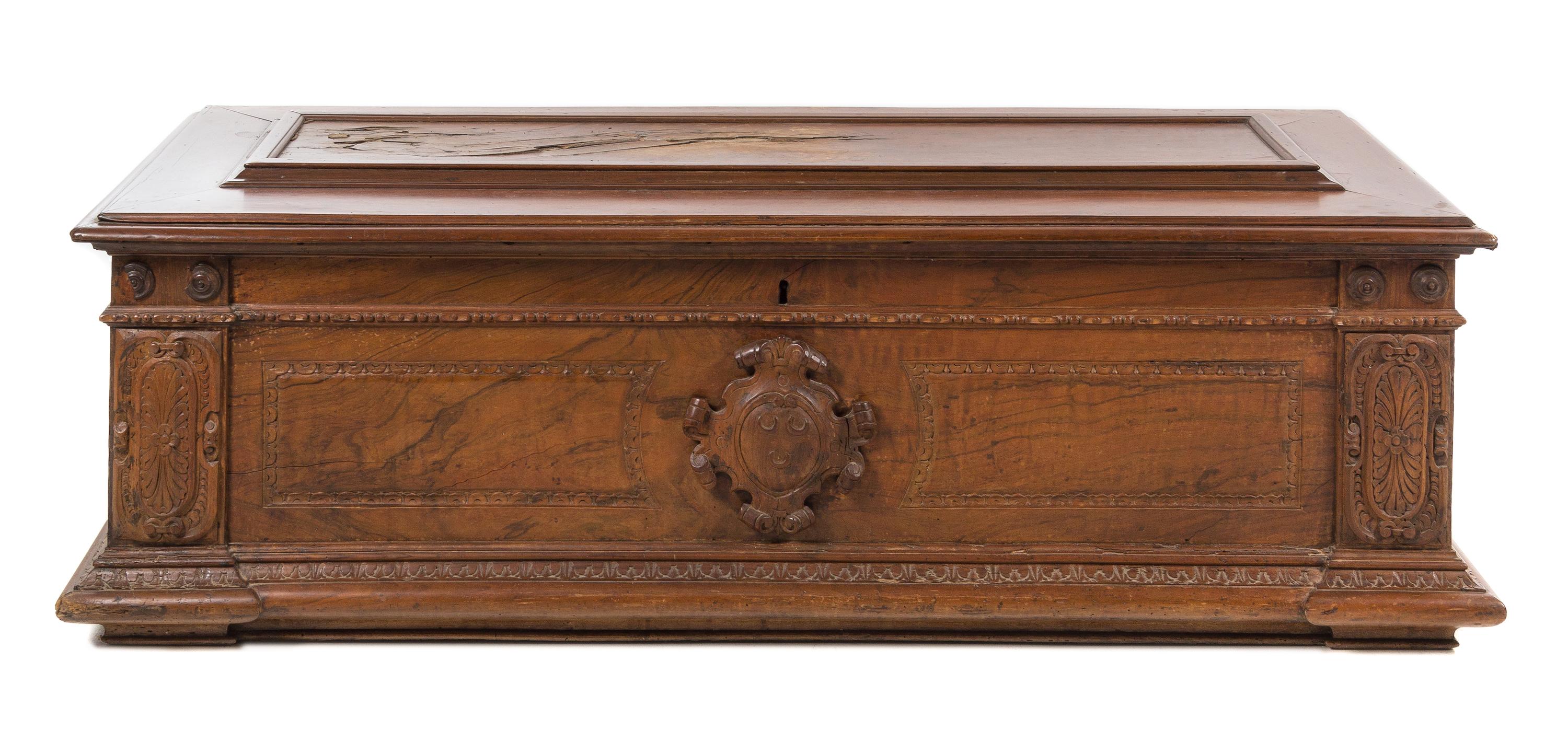A Florentine Walnut Cassone Height 21 x width 69 x depth 25 inches. — 16TH/17TH CENTURY