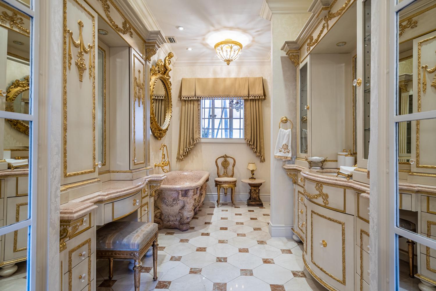 An Italian Carved Rouge Marble Bath Tub — 20th Century
