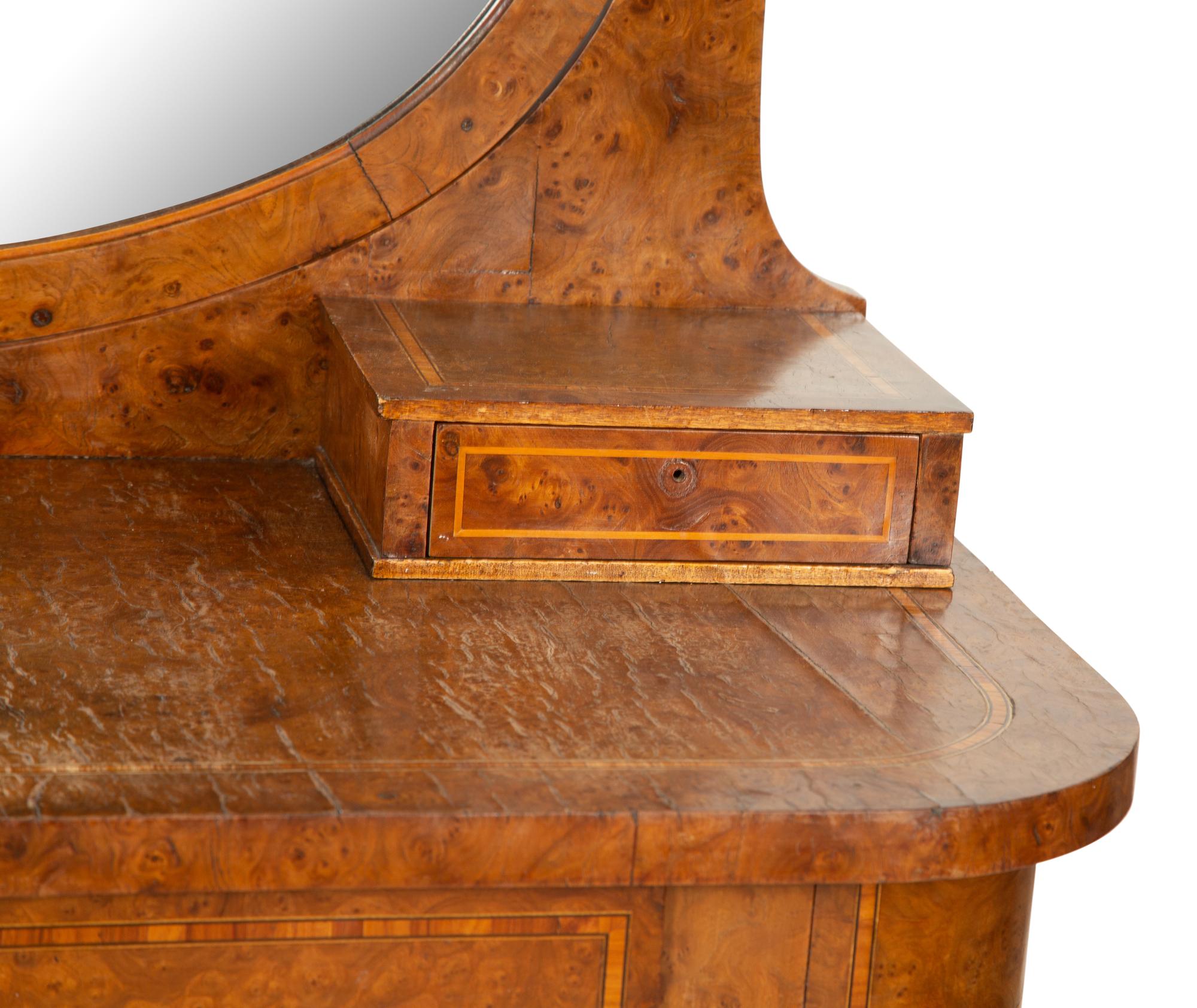 An English Burlwood Dressing Table with Swing Oval Mirror