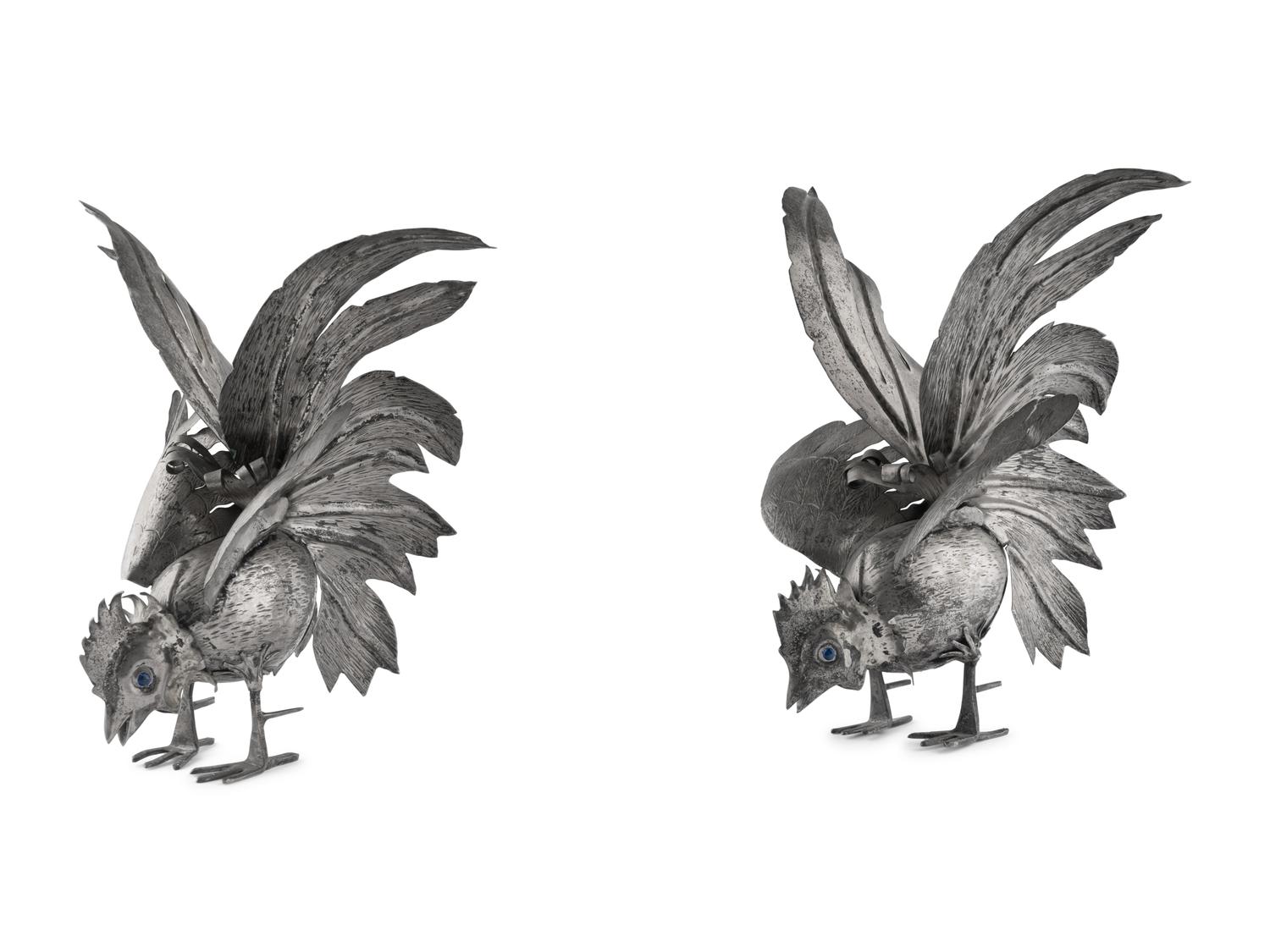 A Pair of Continental Silvered-Metal Roosters