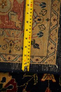 An Indian Persian Design Wool Rug — 20th Century