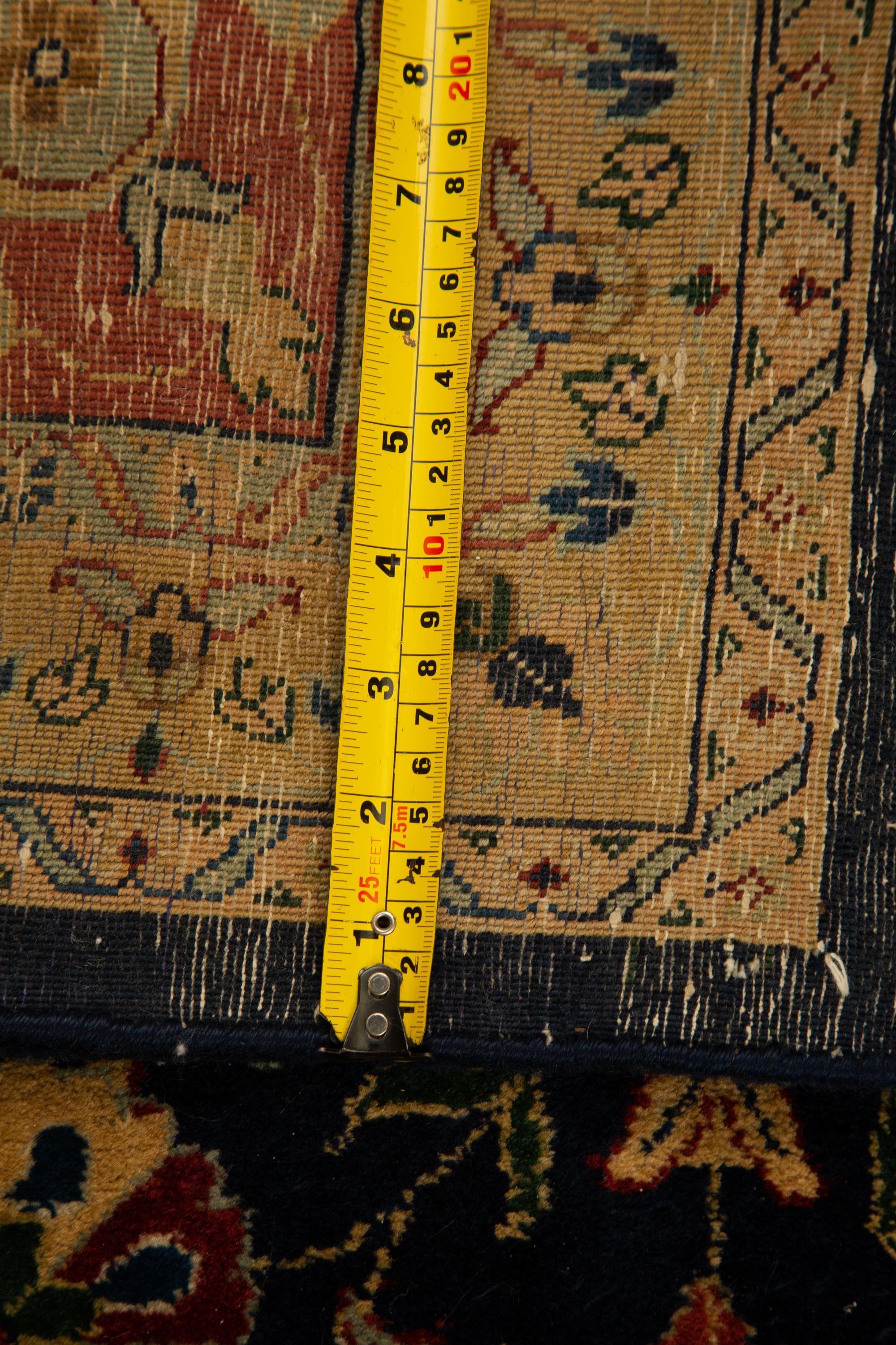 An Indian Persian Design Wool Rug — 20th Century