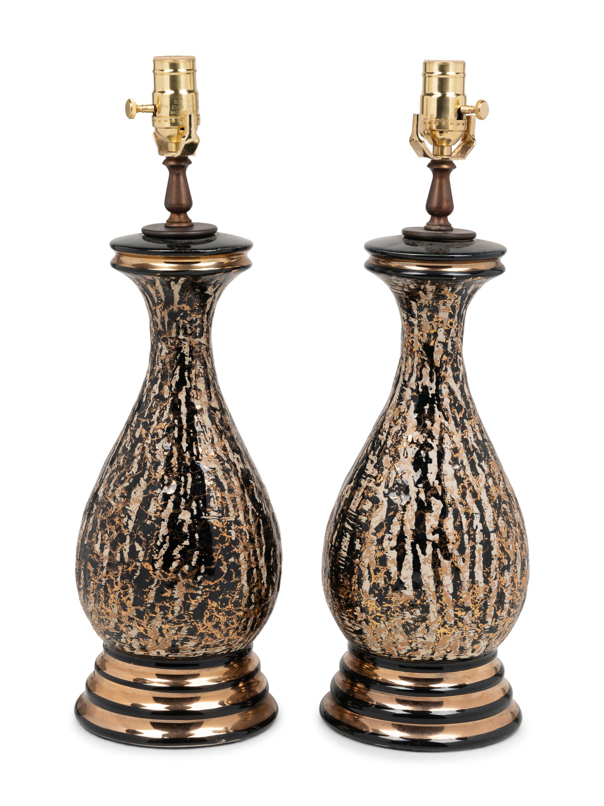 A Pair of Glazed Pottery Vases Mounted as Lamps