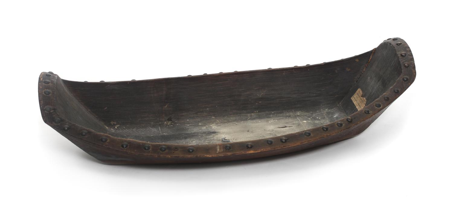 A Kwakwaka'wakw Wood and Brass Food Dish Height 6 1/4 x length 24 x width 12 1/2 inches. — LATE 19TH CENTURY