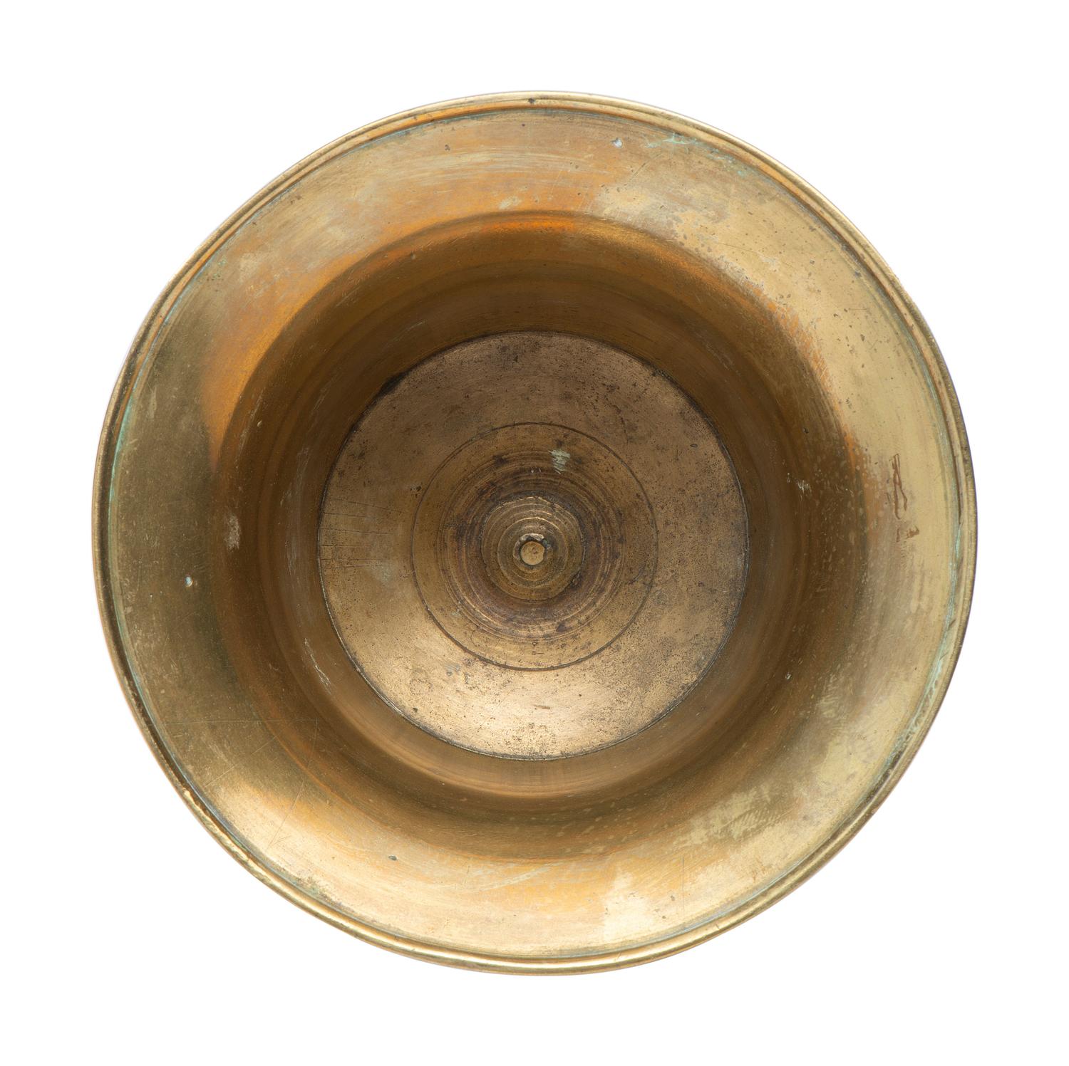 A Continental Brass Heemskerk Candlestick