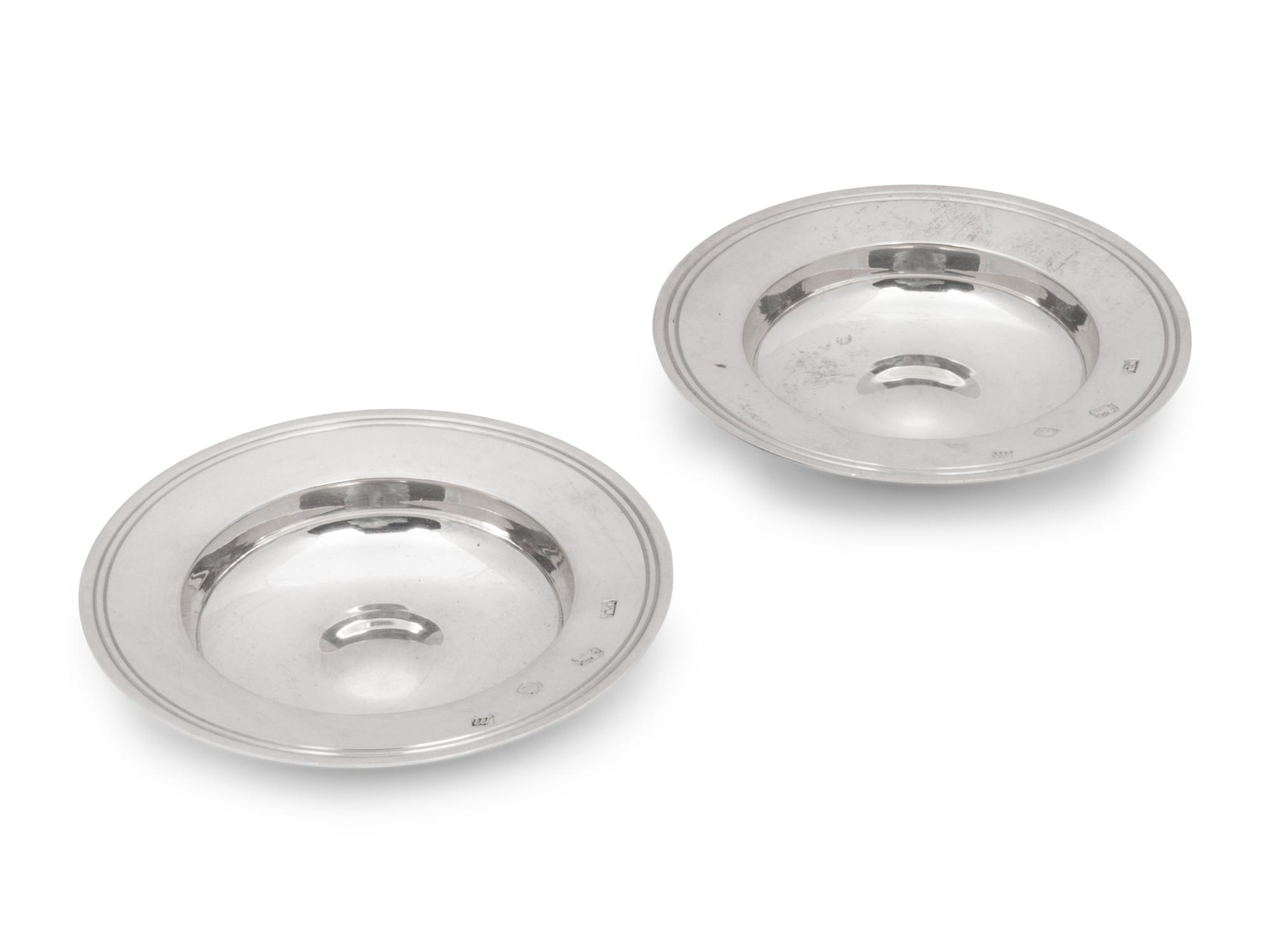 A Pair of English Silver Armada Dishes