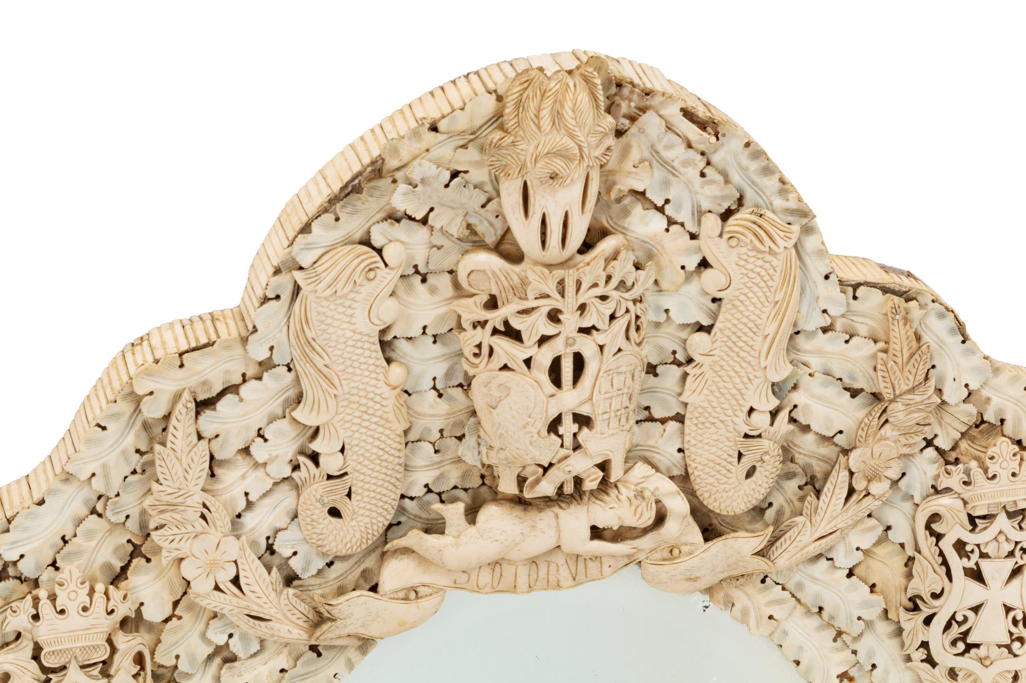 A Pair of Continental Carved Bone Mirrors