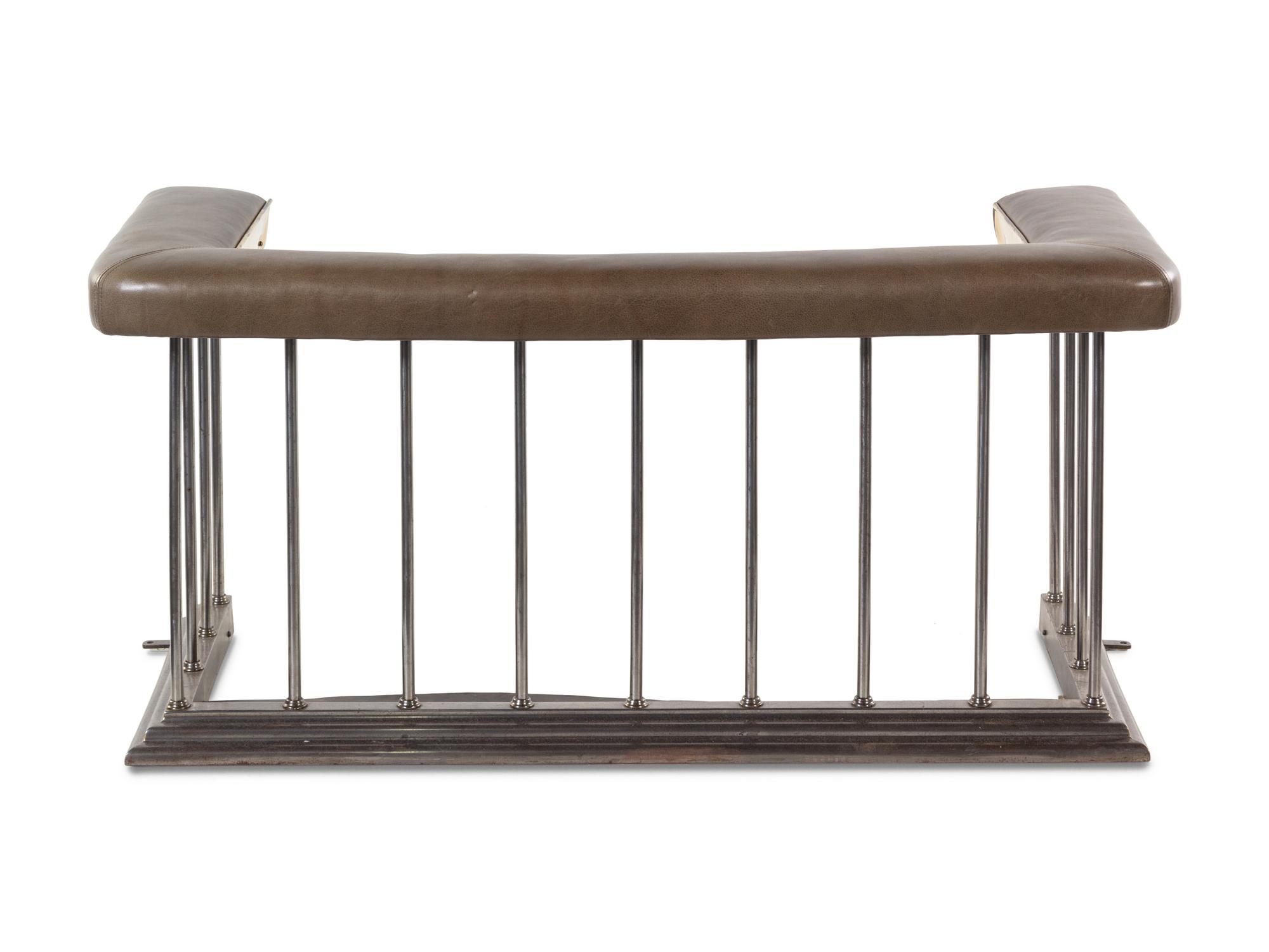 A Chromed Metal and Leather-Upholstered Fireplace Bench and a Brass Fire Fender