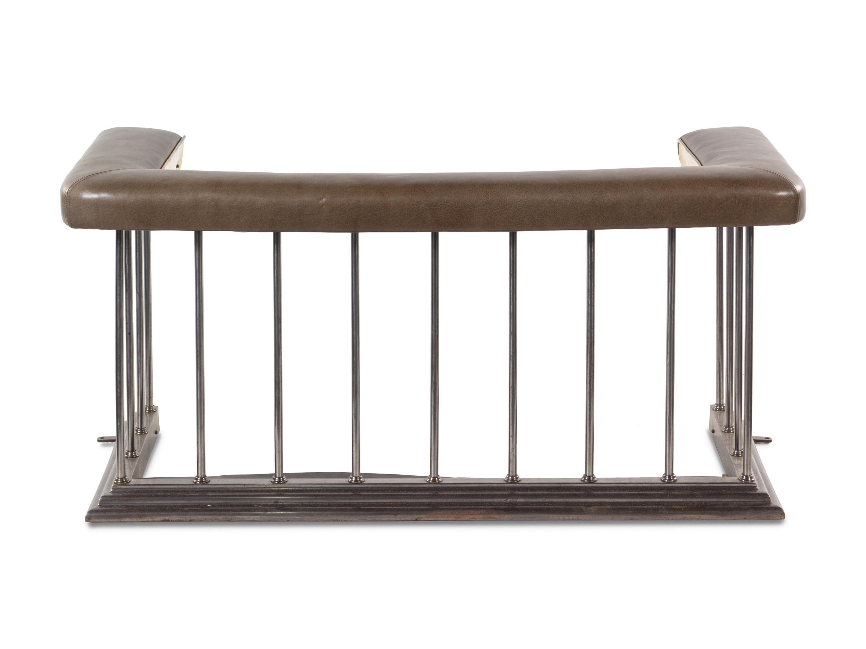 A Chromed Metal and Leather-Upholstered Fireplace Bench and a Brass Fire Fender