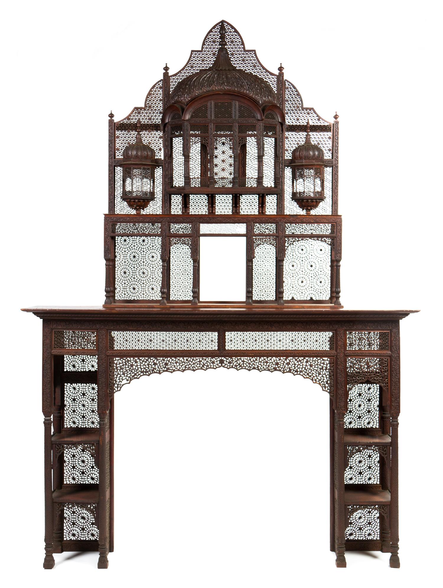 An Anglo-Indian Rosewood Fireplace Surround, in the manner of Lockwood de Forest, Height overall 108 x width 75 1/2 x depth 14 inches.