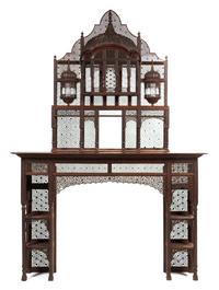 An Anglo-Indian Rosewood Fireplace Surround, in the manner of Lockwood de Forest, Height overall 108 x width 75 1/2 x depth 14 inches.