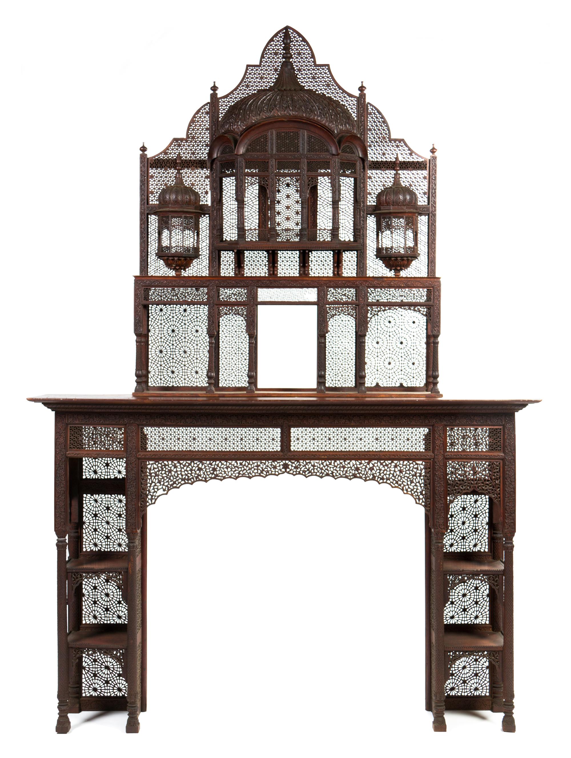 An Anglo-Indian Rosewood Fireplace Surround, in the manner of Lockwood de Forest, Height overall 108 x width 75 1/2 x depth 14 inches.