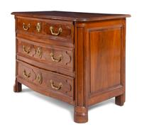 A Régence Gilt Metal Mounted Carved Walnut Serpentine Commode