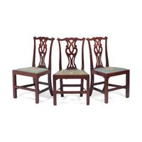 A Group of Three George III Carved Walnut Side Chairs