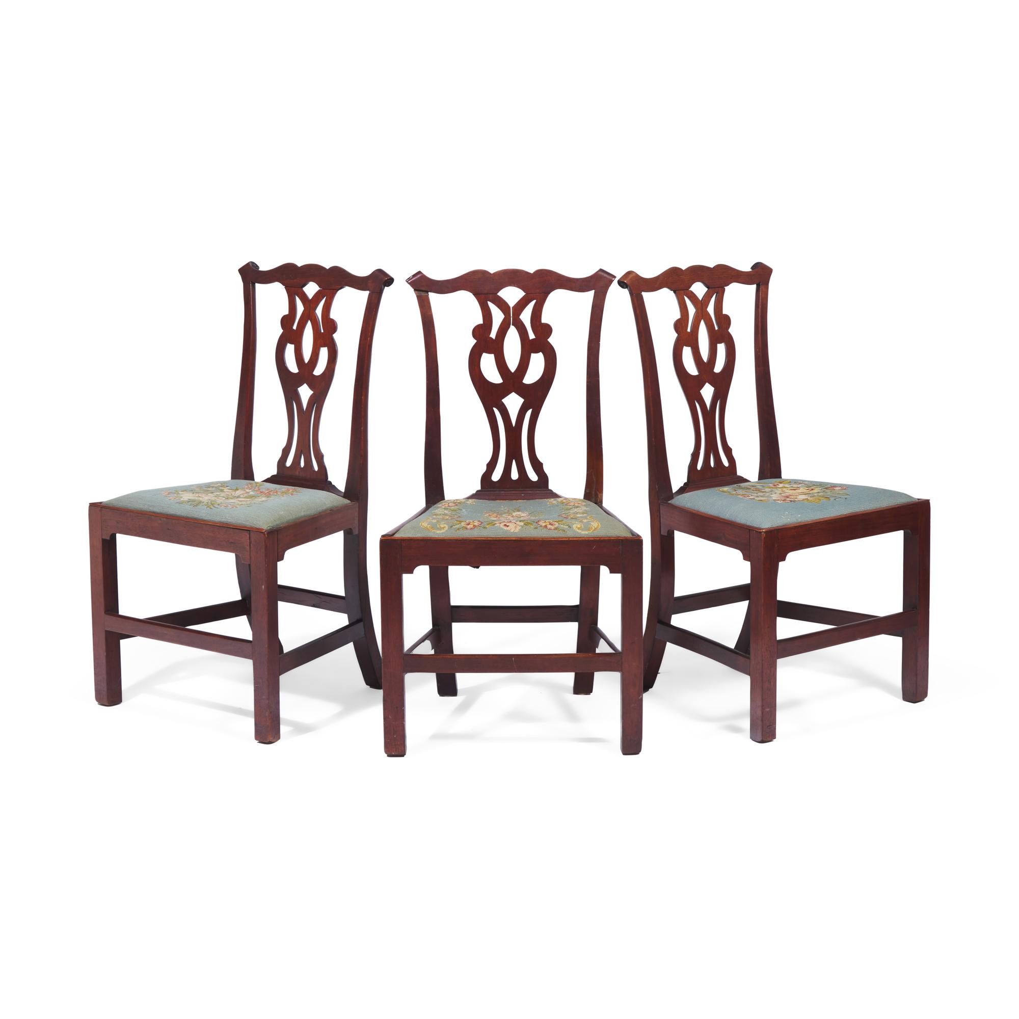 A Group of Three George III Carved Walnut Side Chairs