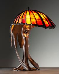 A Cast Bronze and Glass Figural Table Lamp