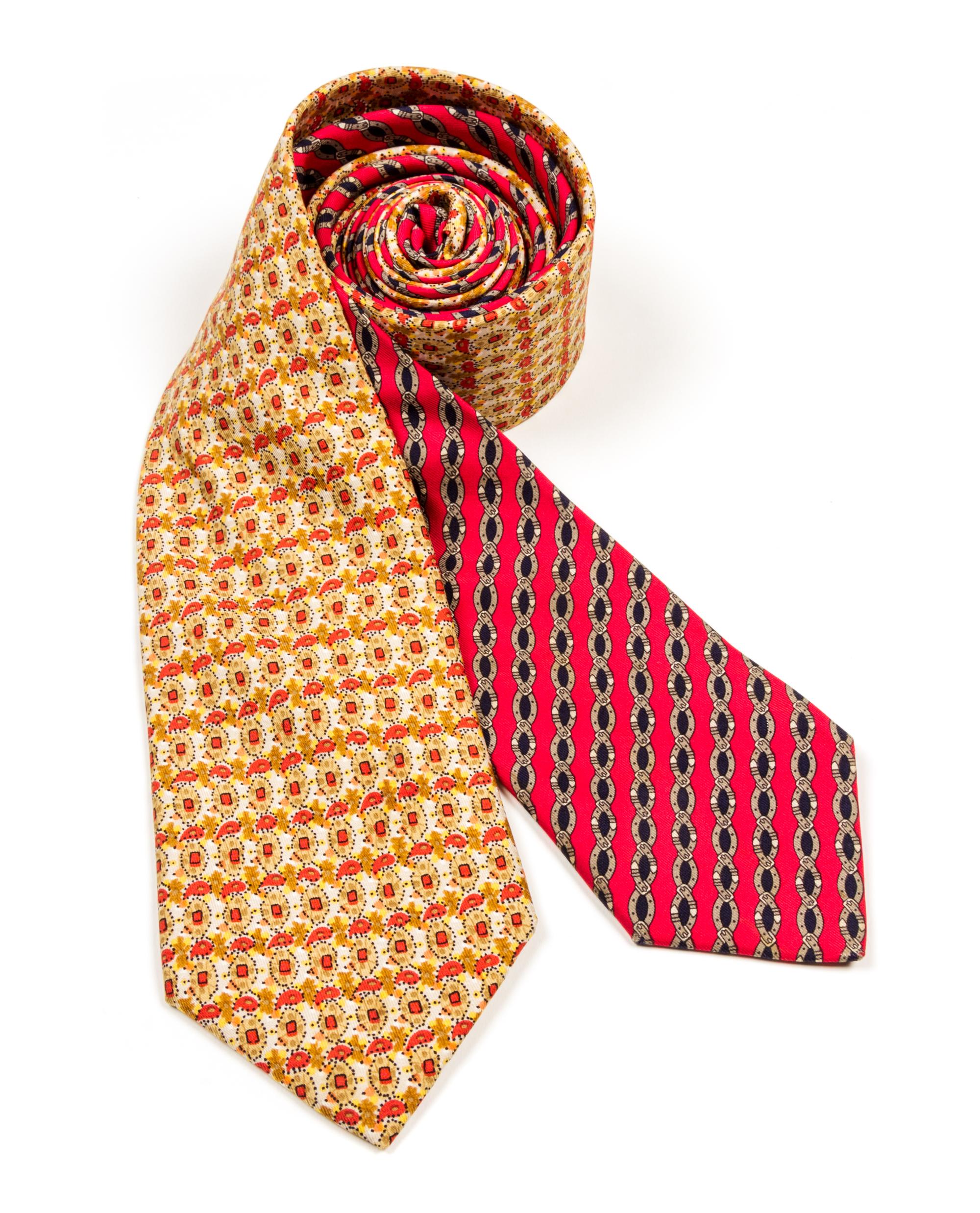A Group of Two Hermes Silk Ties, 3.15" wide.