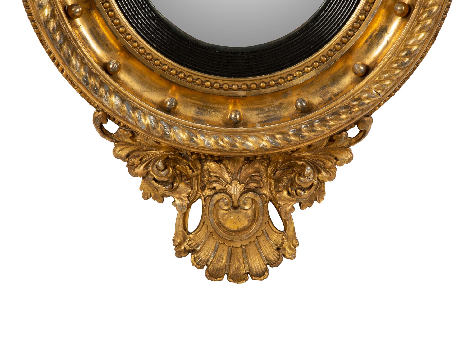 A Regency Giltwood Convex Girandole Mirror