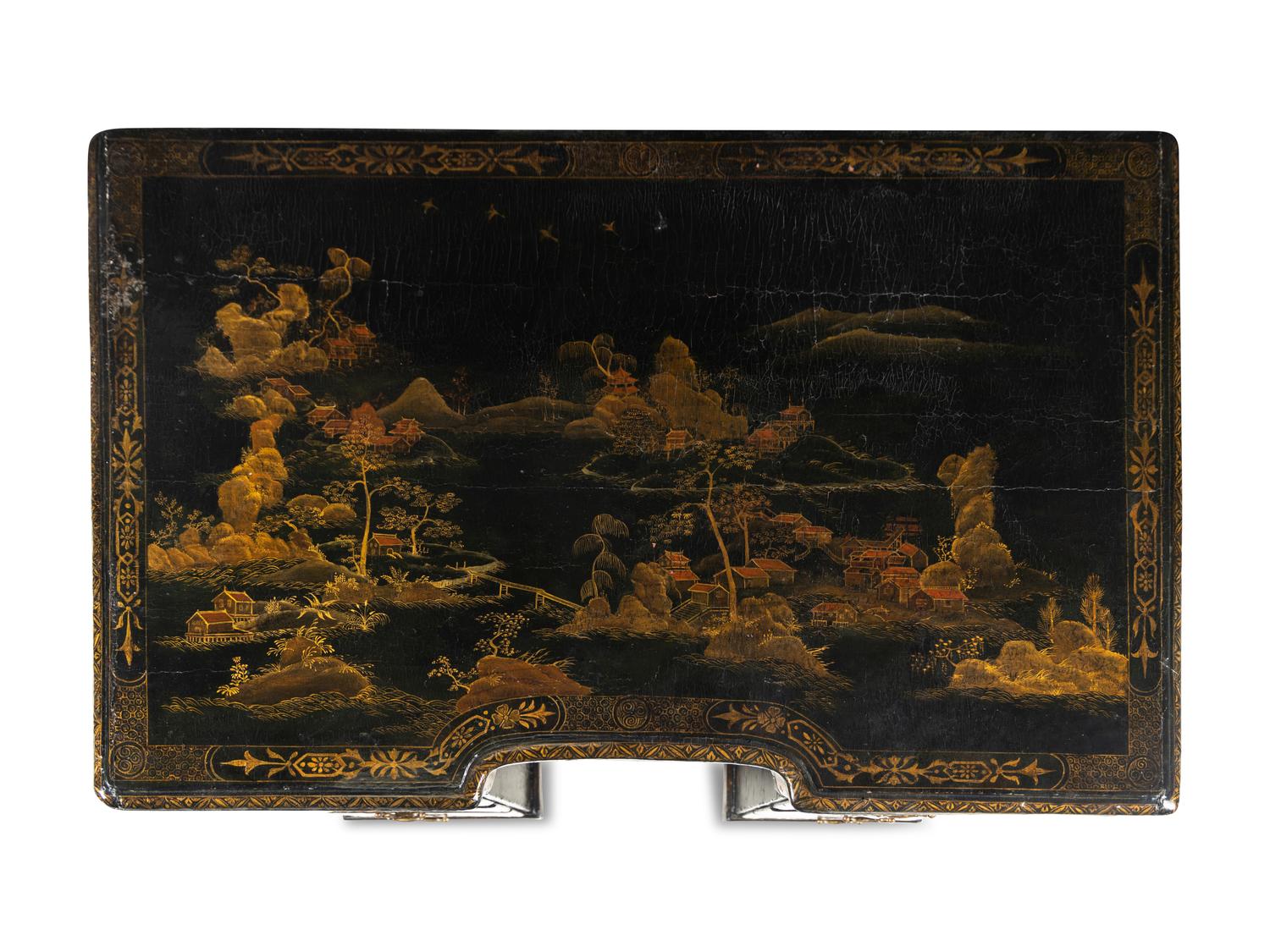 A Chinese Export Black and Gilt Lacquered Kneehole Desk