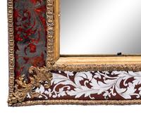 A Swedish Baroque Verre Églomisé and Giltwood Mirror