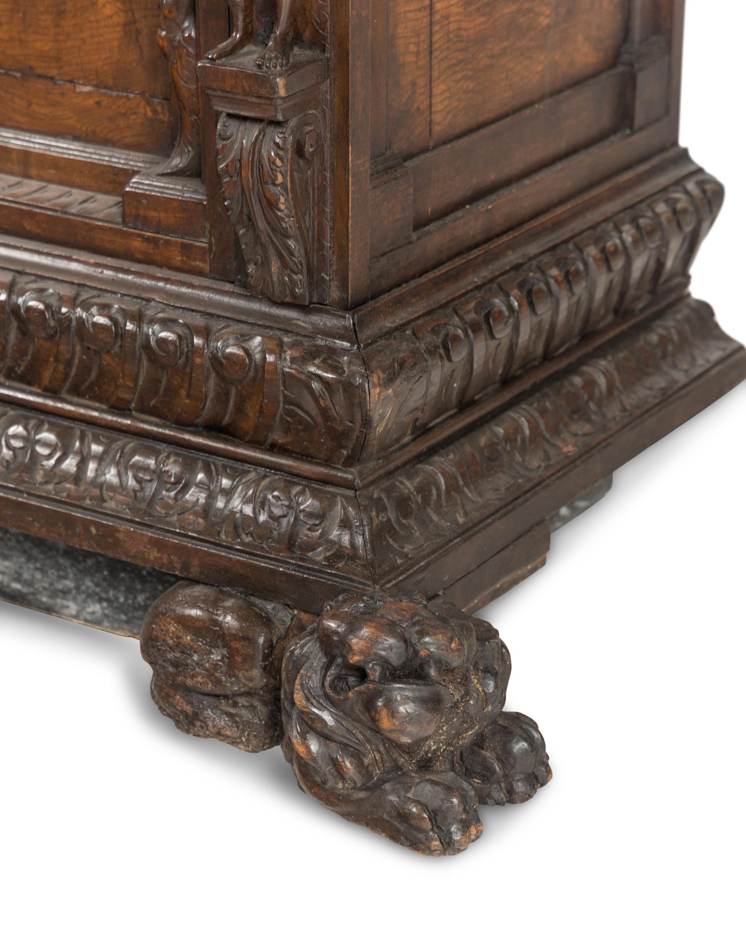 An Italian Renaissance Style Walnut Cabinet