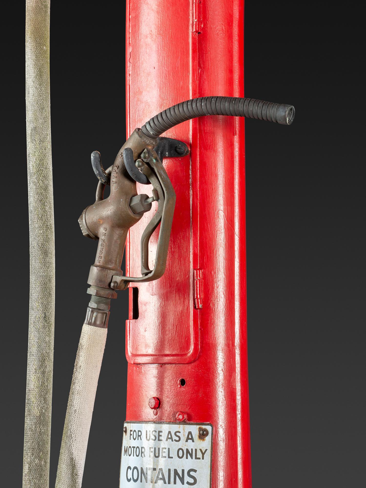An American Painted Metal Gravity Gas Pump, Guarantee Liquid Measure
