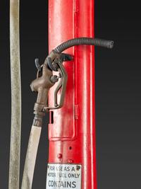 An American Painted Metal Gravity Gas Pump, Guarantee Liquid Measure