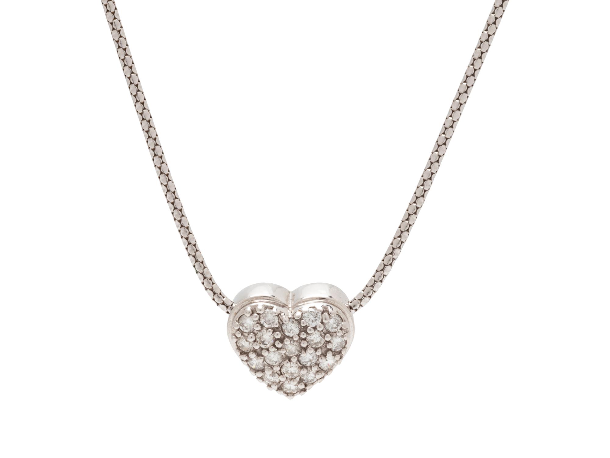 A 14 Karat White Gold and Diamond Heart Pendant/Necklace,