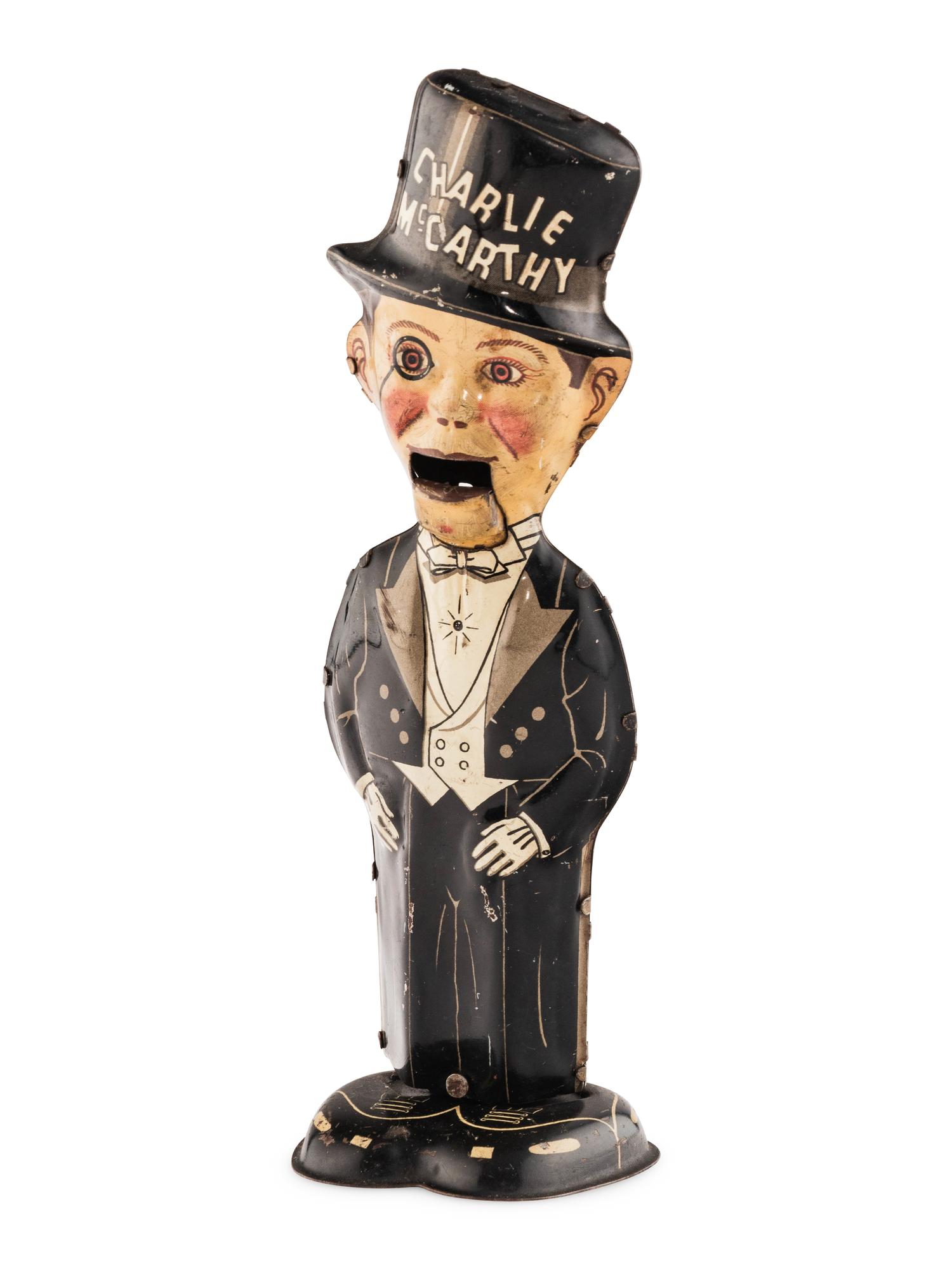 A Group of Three Tin Lithograph Walker Toys