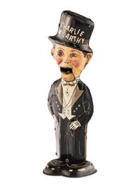 A Group of Three Tin Lithograph Walker Toys