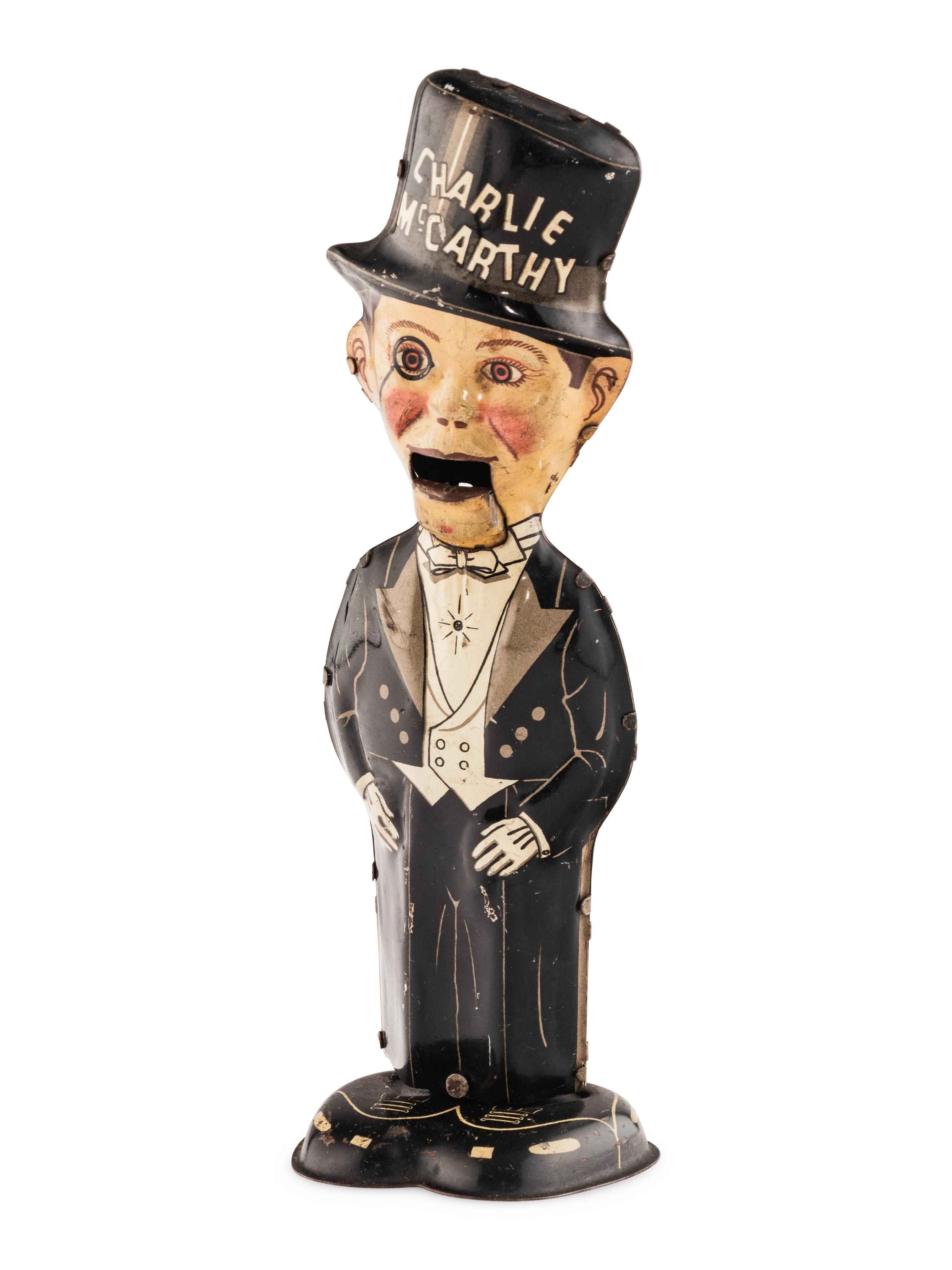 A Group of Three Tin Lithograph Walker Toys
