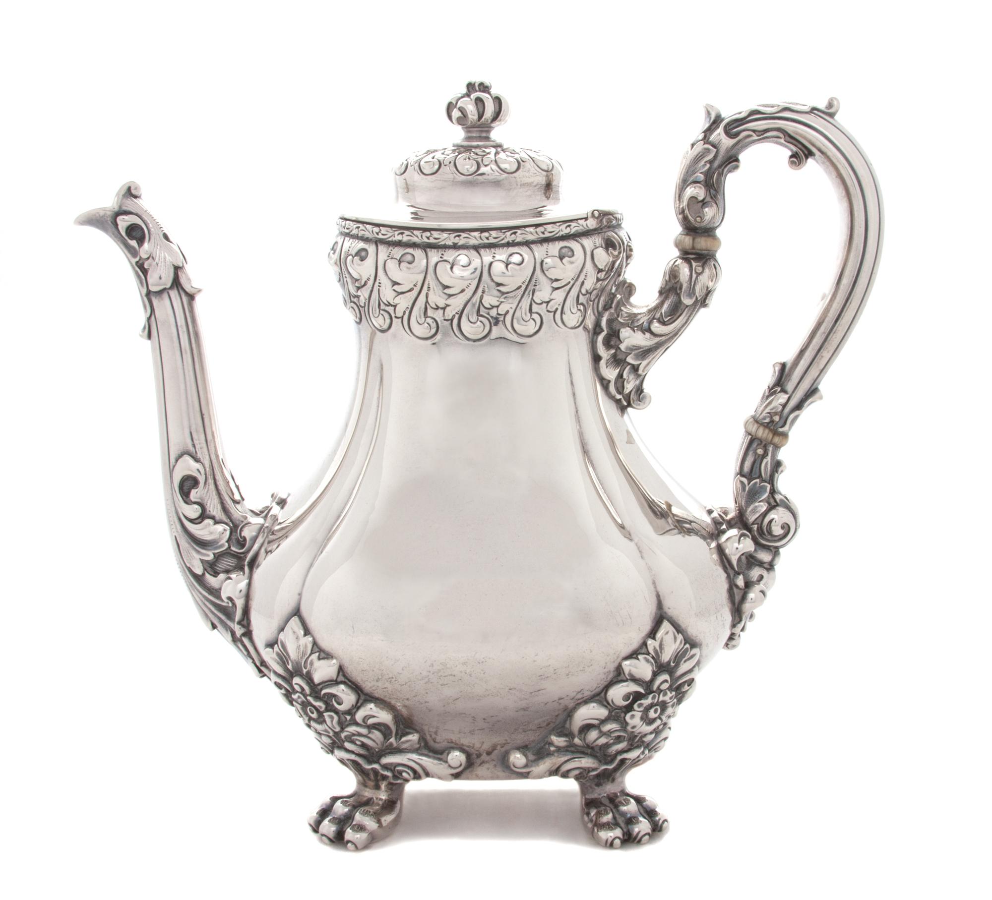 An American Silver Teapot, Theodore B. Starr, New York, NY, of baluster form, the handle and spout with acanthus decoration, raised on