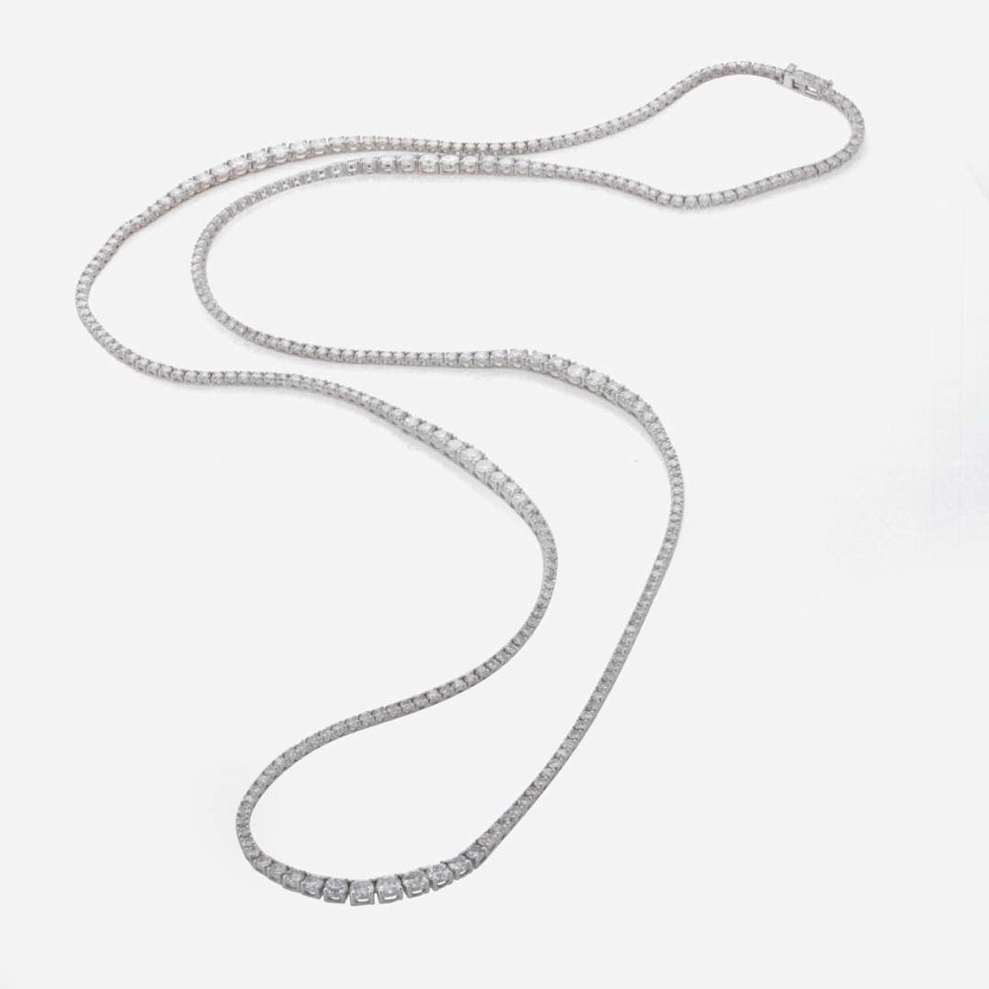 A Diamond and 18K White Gold Rivière Style Necklace