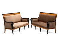 A Pair of Directoire Style Parcel Ebonized Burlwood Settees
