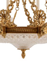 An Empire Style Gilt Metal and Cut Glass Eight-Light Chandelier