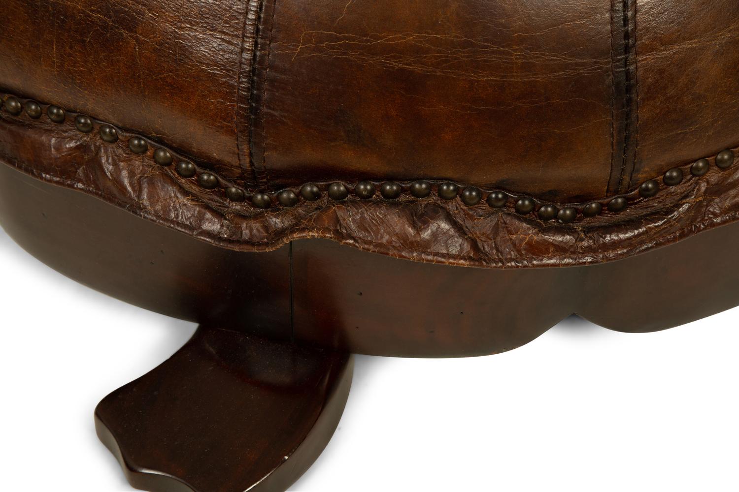 A Carved Wood and Leather Turtle Foot Stool — LATE 20TH CENTURY