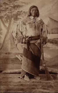 H.B. Calfee (American, 1847-1912) — Studio Portrait of a Double-Armed Native American Leader