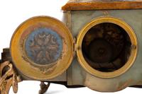 A Neoclassical Gilt Metal and Onyx Clock Garniture