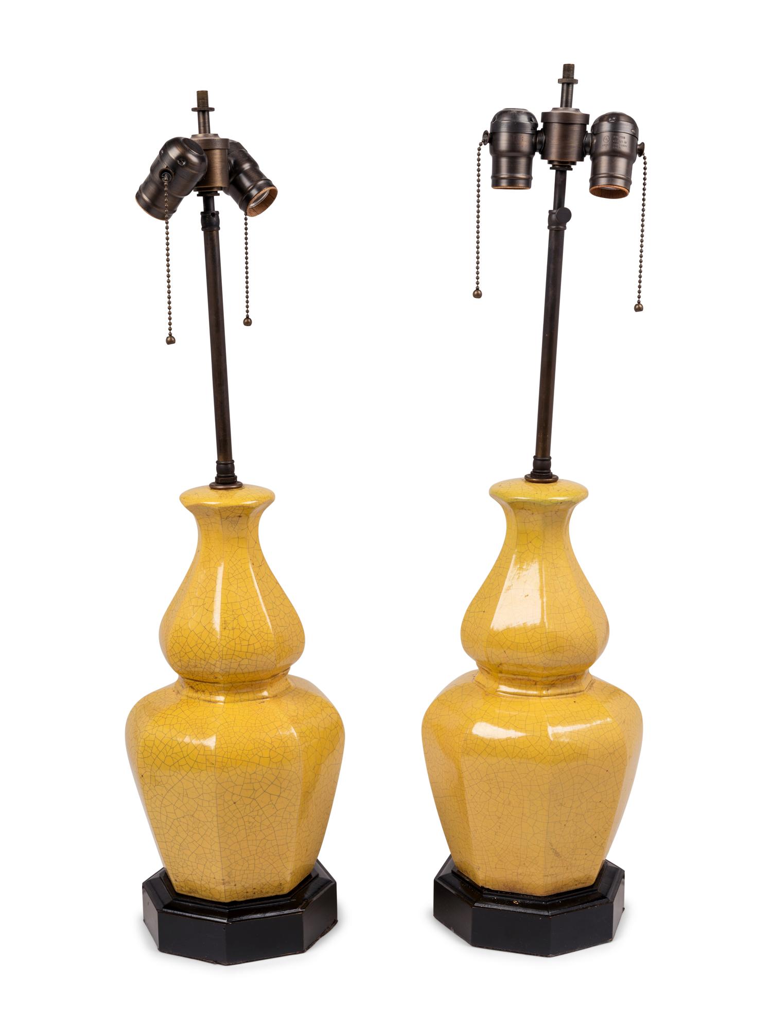 A Pair of Yellow Glazed Pottery Lamps
