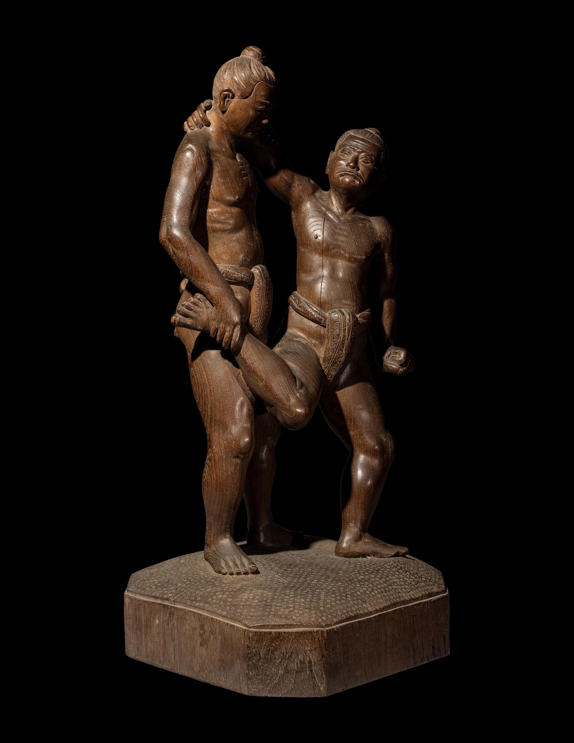 A Large Japanese Carved Wood Figural Group of Wrestlers