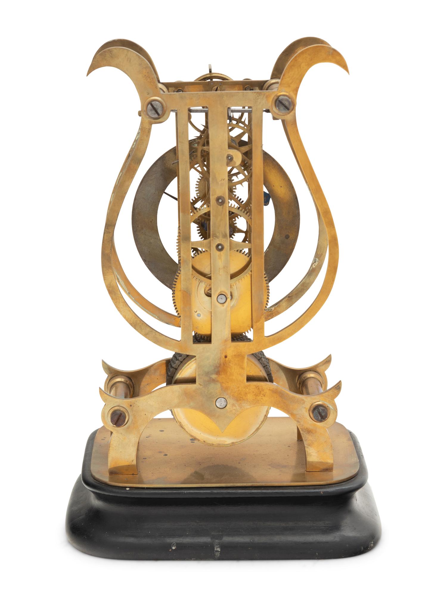 A Brass Lyre-Form Skeleton Clock