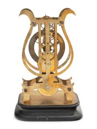 A Brass Lyre-Form Skeleton Clock
