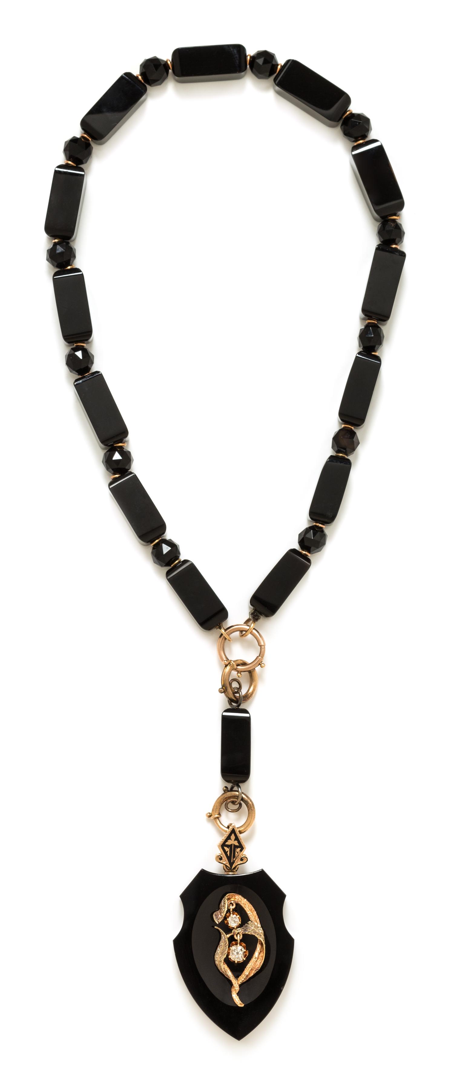 A Victorian Rose Gold, Onyx and Diamond Mourning Pendant/Necklace, 58.40 dwts.