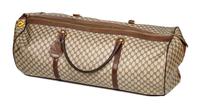 A Gucci Monogram Canvas Duffle Bag, 11" H x 31" W x 15" D; Handle drop: 8.5".
