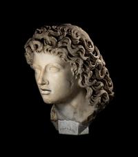 A Roman Marble Head of a Triton