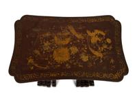 A Set of Four Chinese Lacquered Nesting Tables