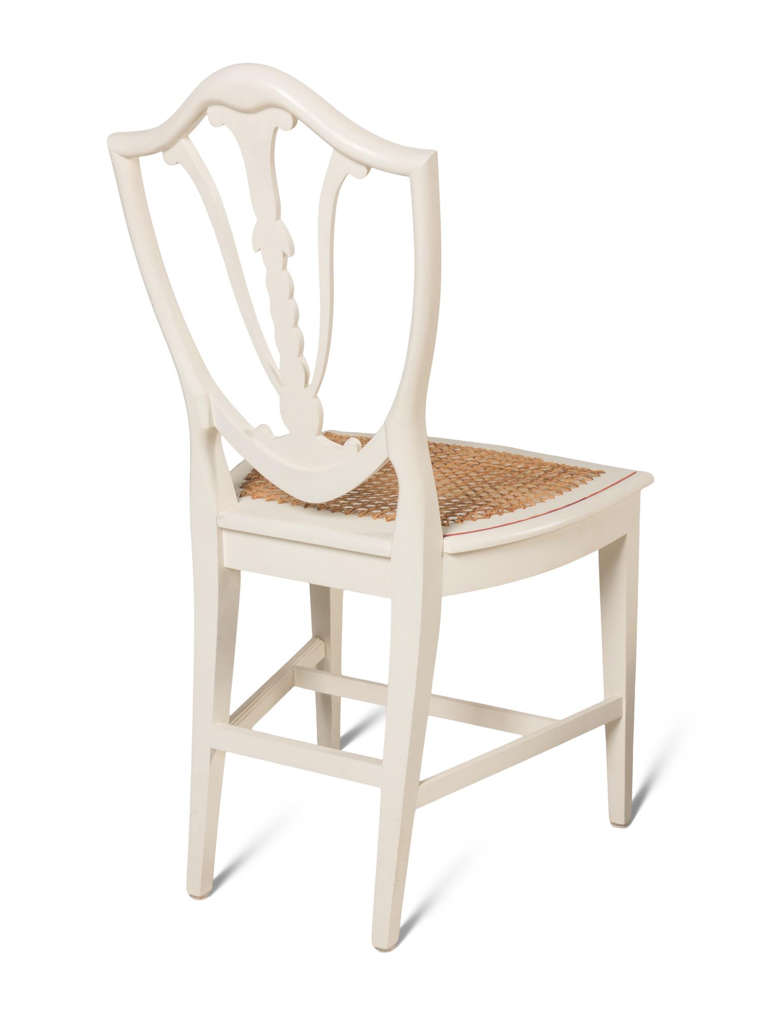 A Set of Thirty Georgian Style Painted Dining Chairs